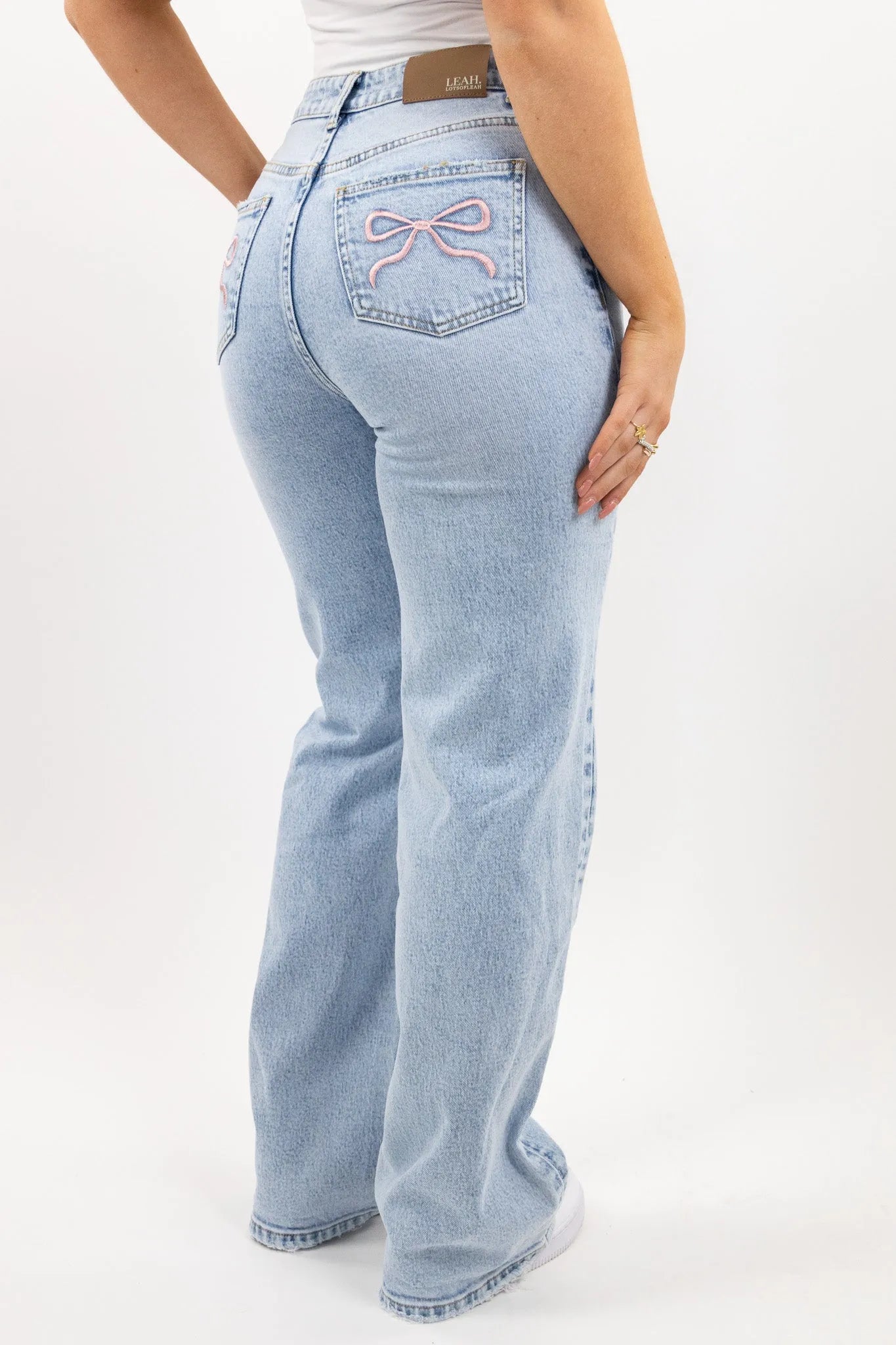 Vaqueros lazo rosa
